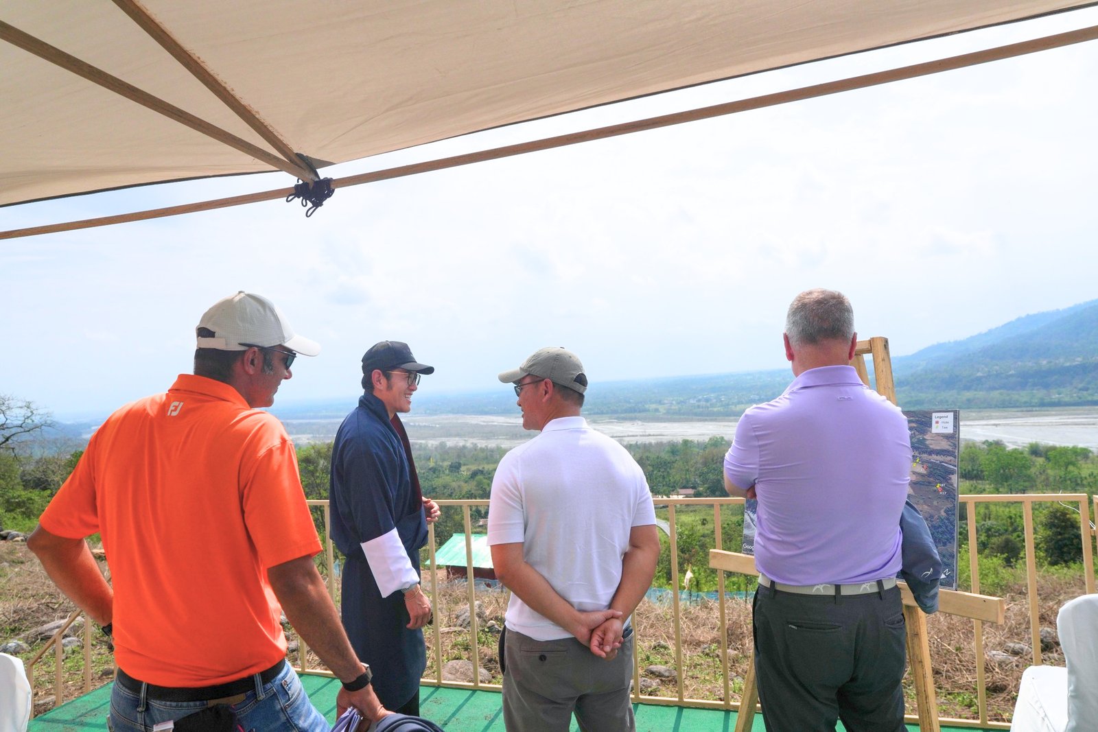 Golf in Gelephu Mindfulness City site visit overlooking the valley